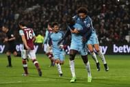 STRATFORD, ENGLAND - FEBRUARY 01:  Yaya Toure of Manchester City celebrates scoring his team's fourth goal with Leroy Sane during the Premier League match between West Ham United and Manchester City at London Stadium on February 1, 2017 in Stratford, England.  (Photo by Clive Rose/Getty Images)